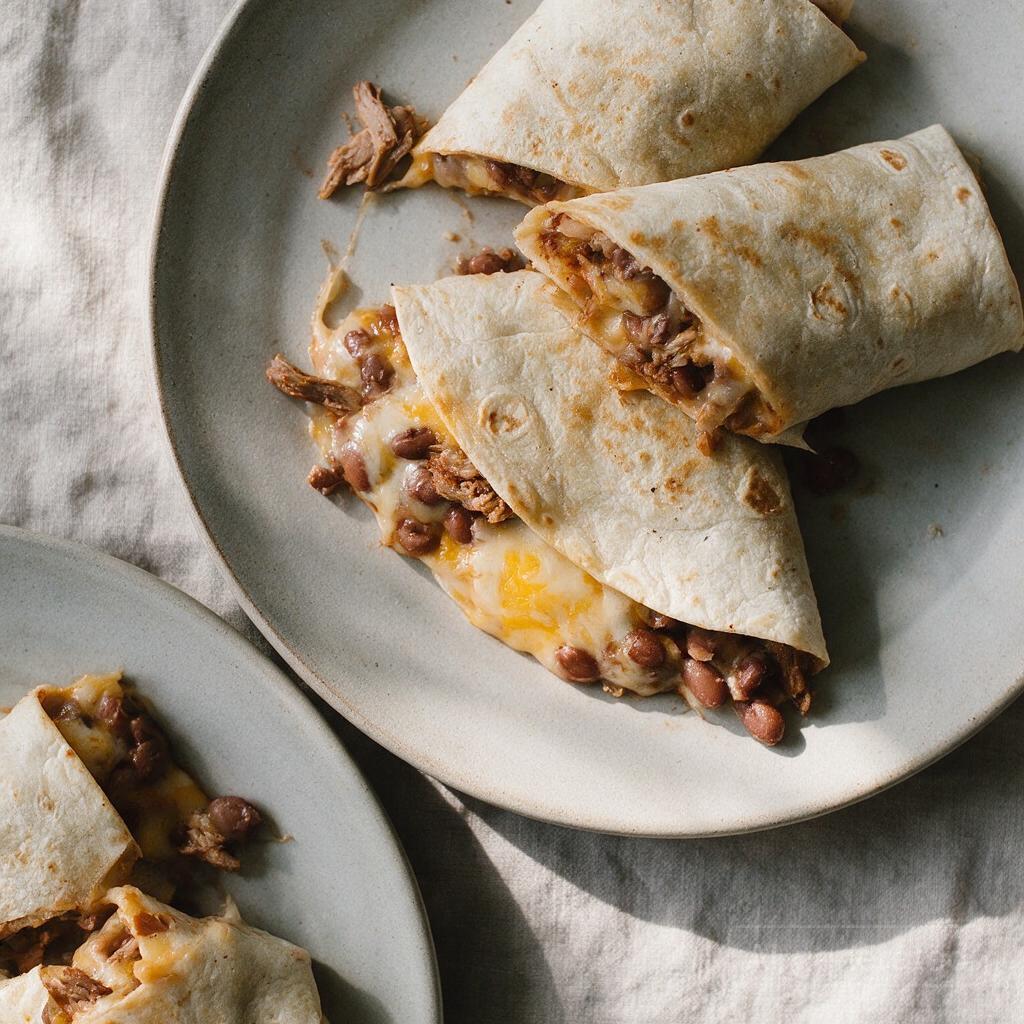 Quesadillas or wraps with cheese, beans, or leftover meat, plus any salsa, veg, or sauce